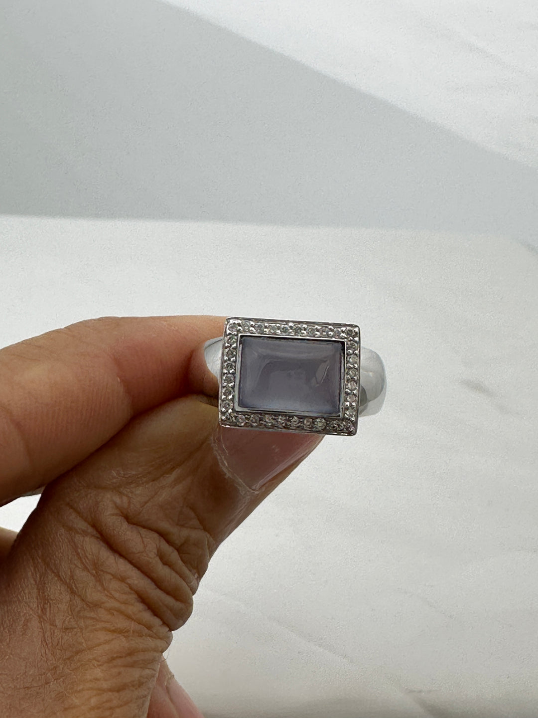 18 karat Chalcedony Cabochon and Diamond Halo Ring