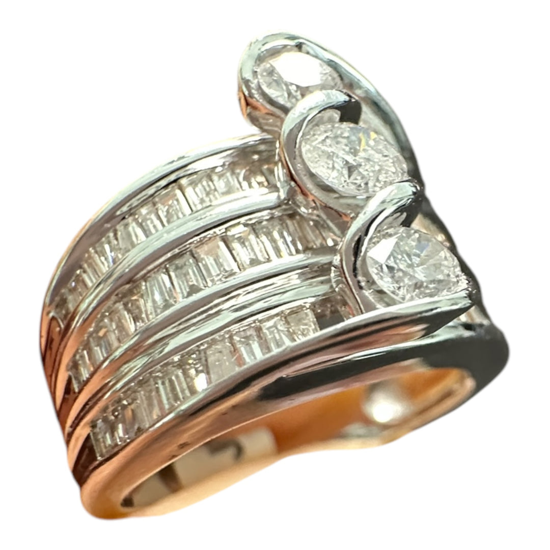 Contemporary 3-Stone 14kt gold 1.50ct baguette ring.