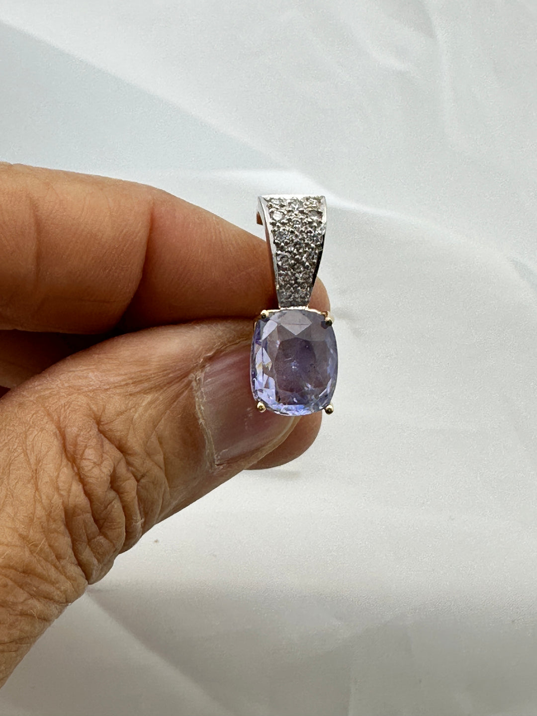 Certified 8.13 carat, Sri Lanka cushion blue sapphire, diamond enhancer pendant