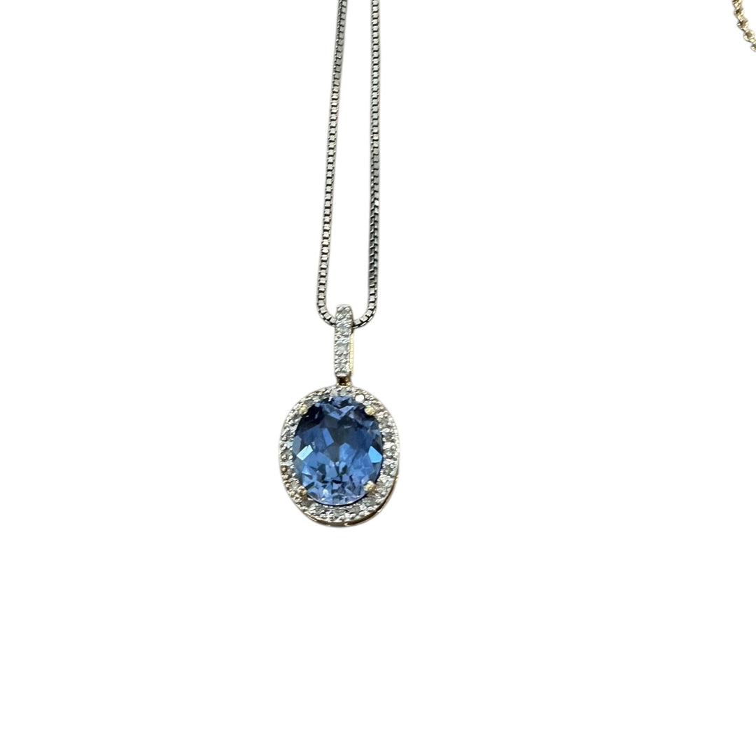 14 karat diamond halo Tanzanite pendant
