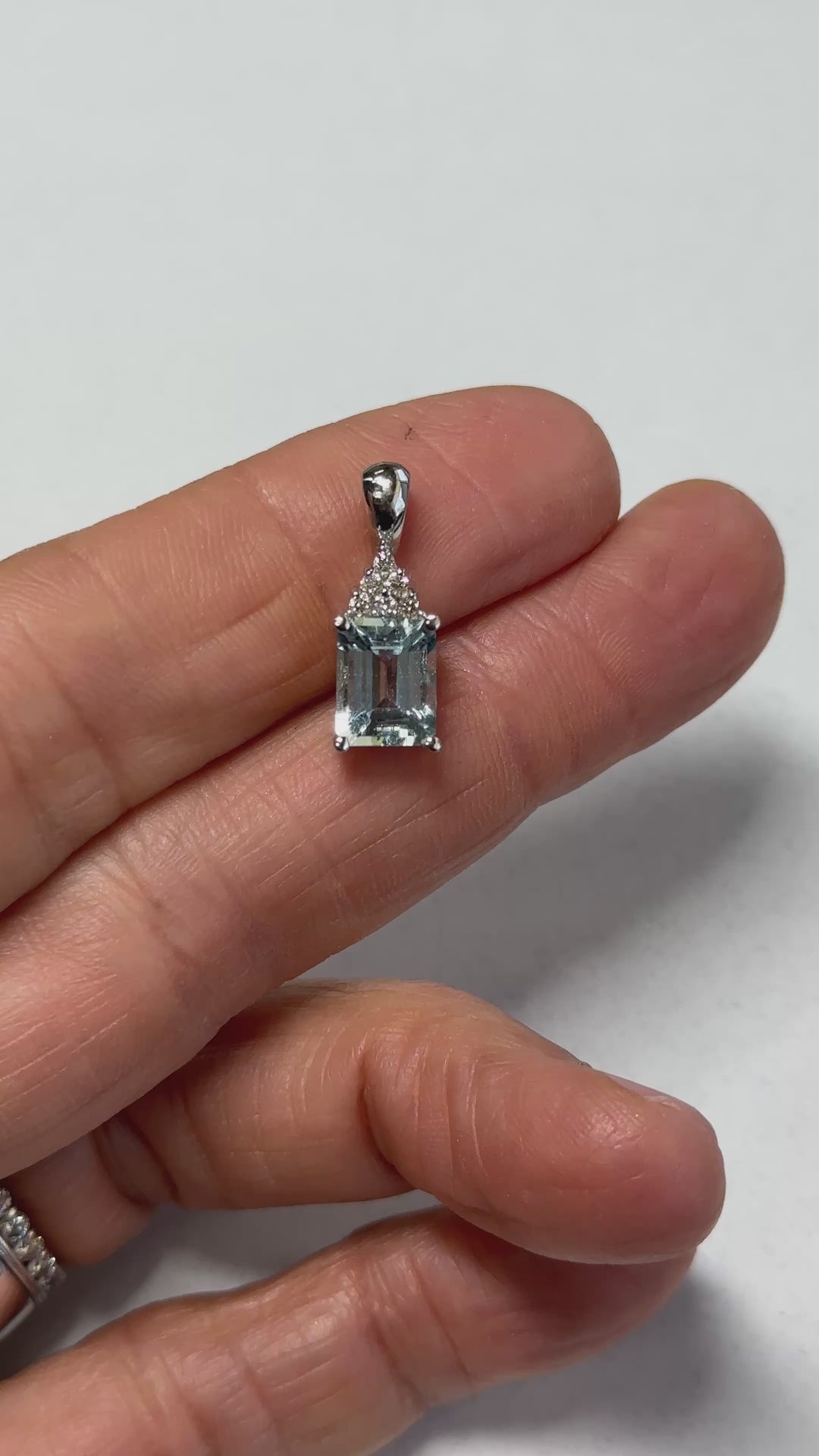 14 karat white gold, aquamarine, diamond pendant