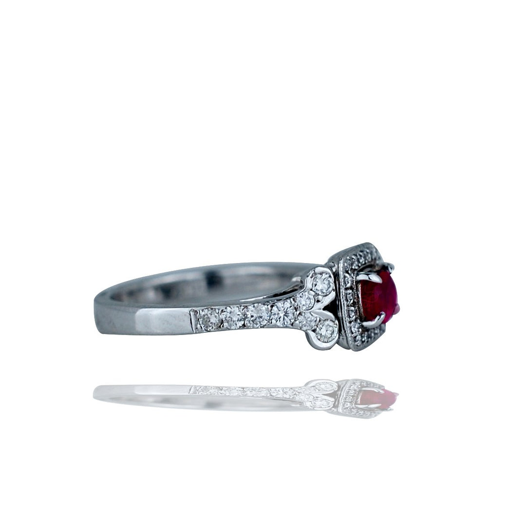 14kt Ruby and Diamond Halo Ring .85tw White gold