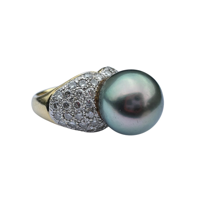 Mid-century, 18 karat Tahitian 12 mm pearl with 1.50 carat diamonds