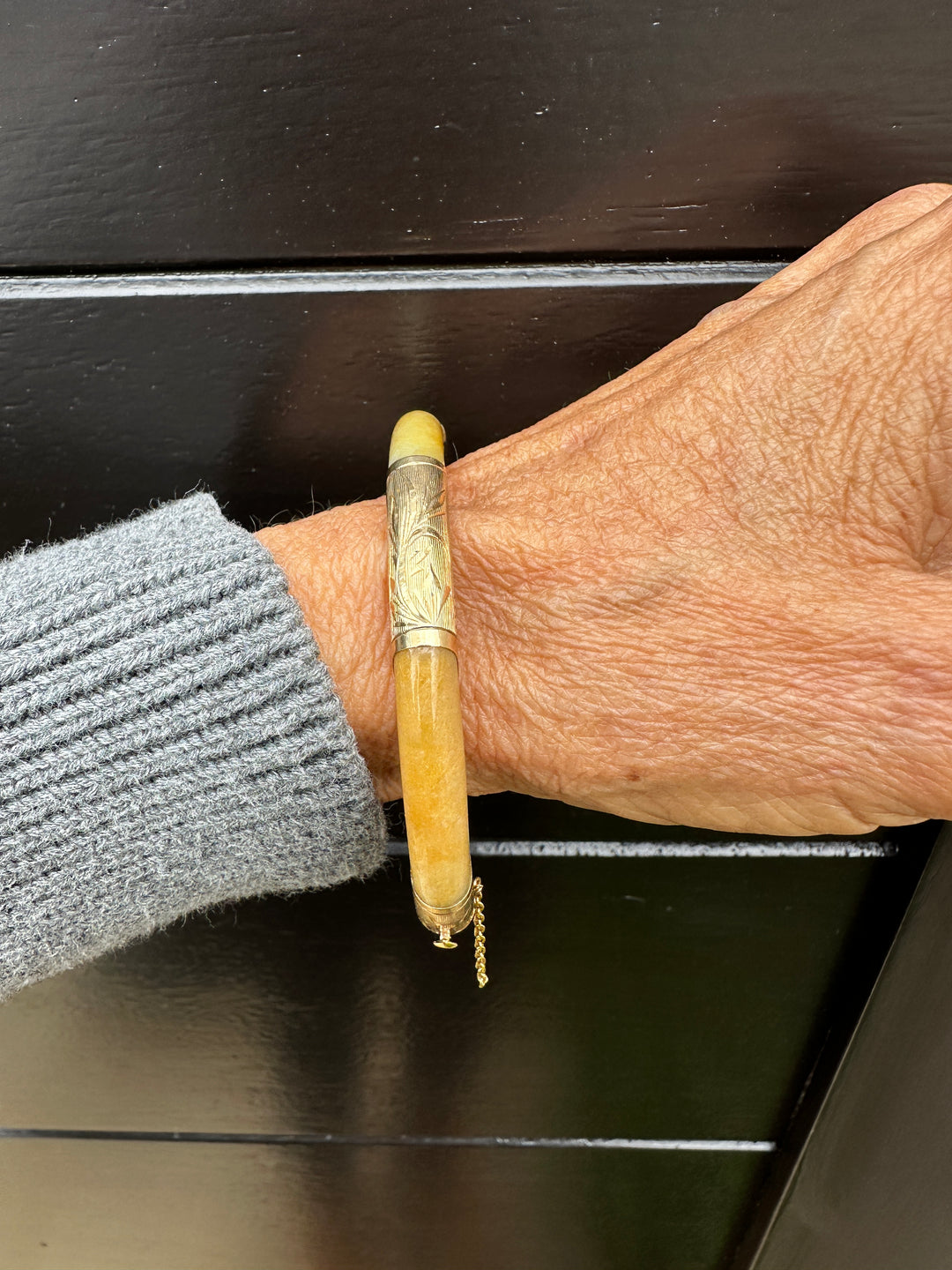 14 karat yellow gold butterscotch jadeite 7.40 mm bangle bracelet