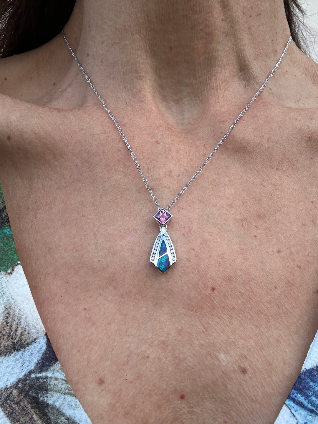 14 karat Opal, tourmaline, and diamond pendant with chain