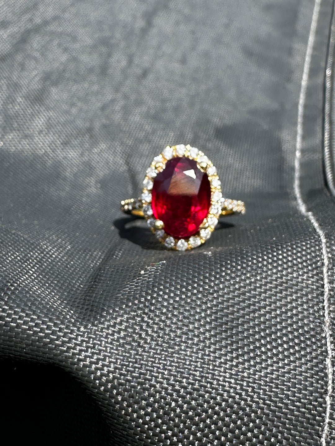 14 karat 3.93 carat red ruby halo ring