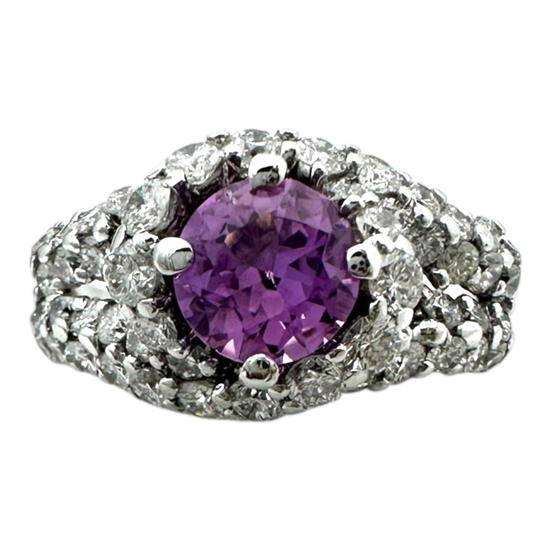 ￼ 14 karat white gold, pink, sapphire, and diamond Paved halo split shank ring