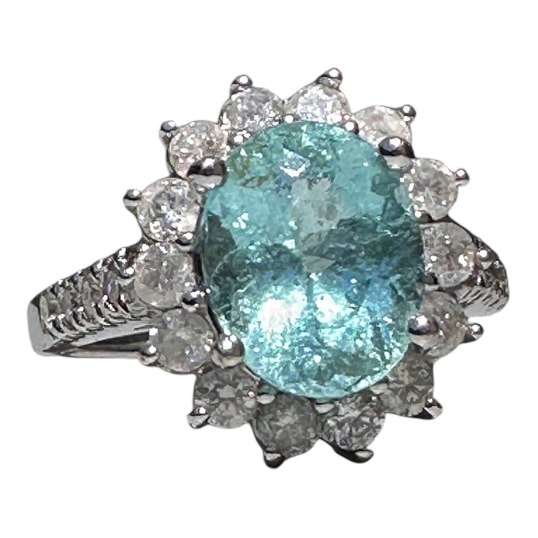 14 karat white gold neon 4.50 Carat Paraiba Tourmaline halo diamond ring