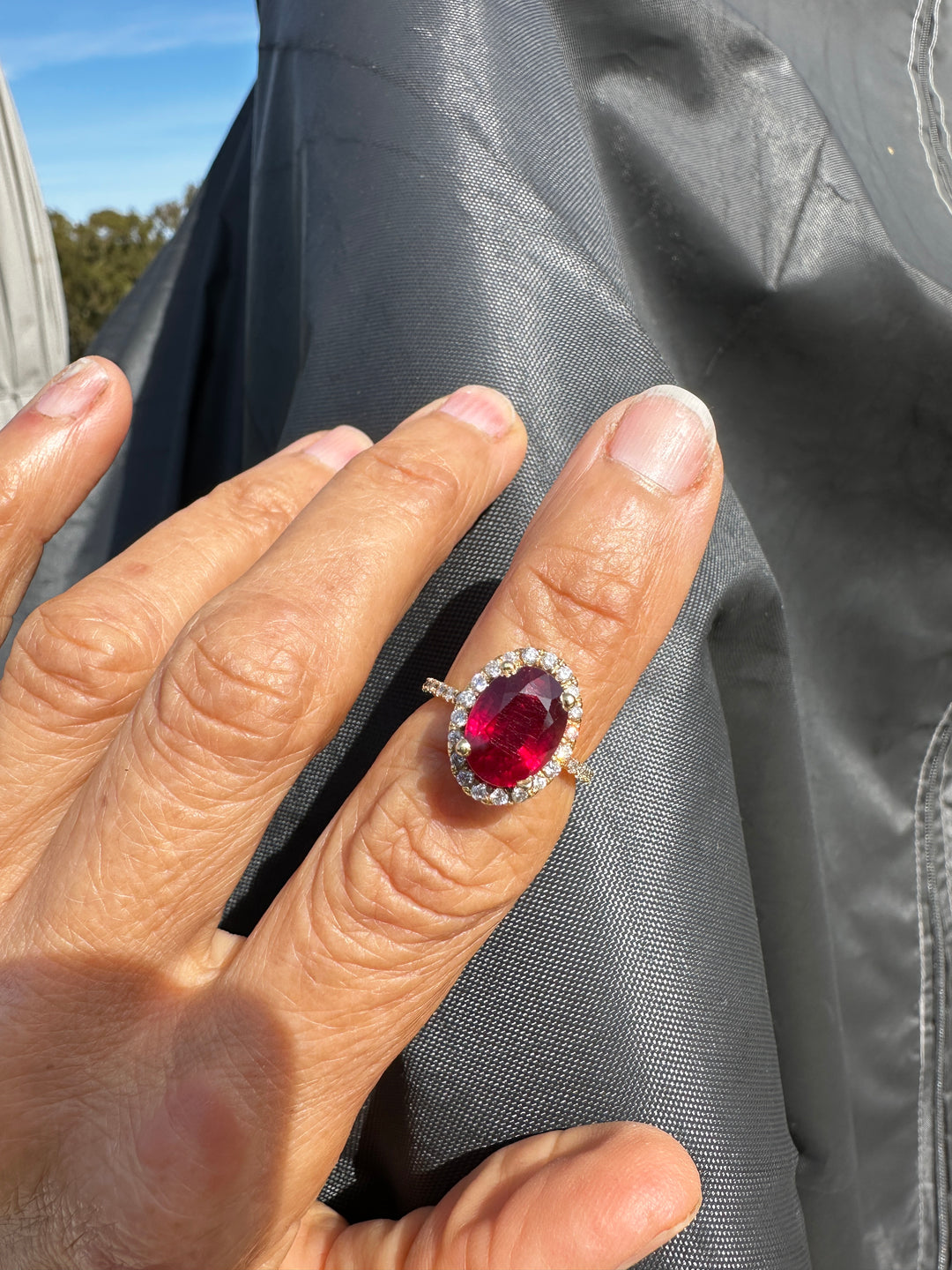 14 karat 3.93 carat red ruby halo ring