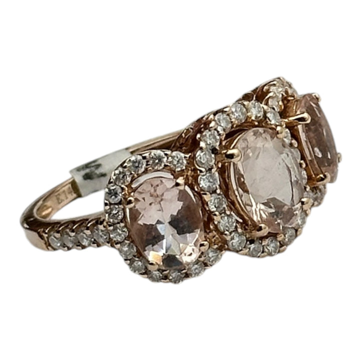 14 karat pink gold, 3-stone Morganite diamond halo ring