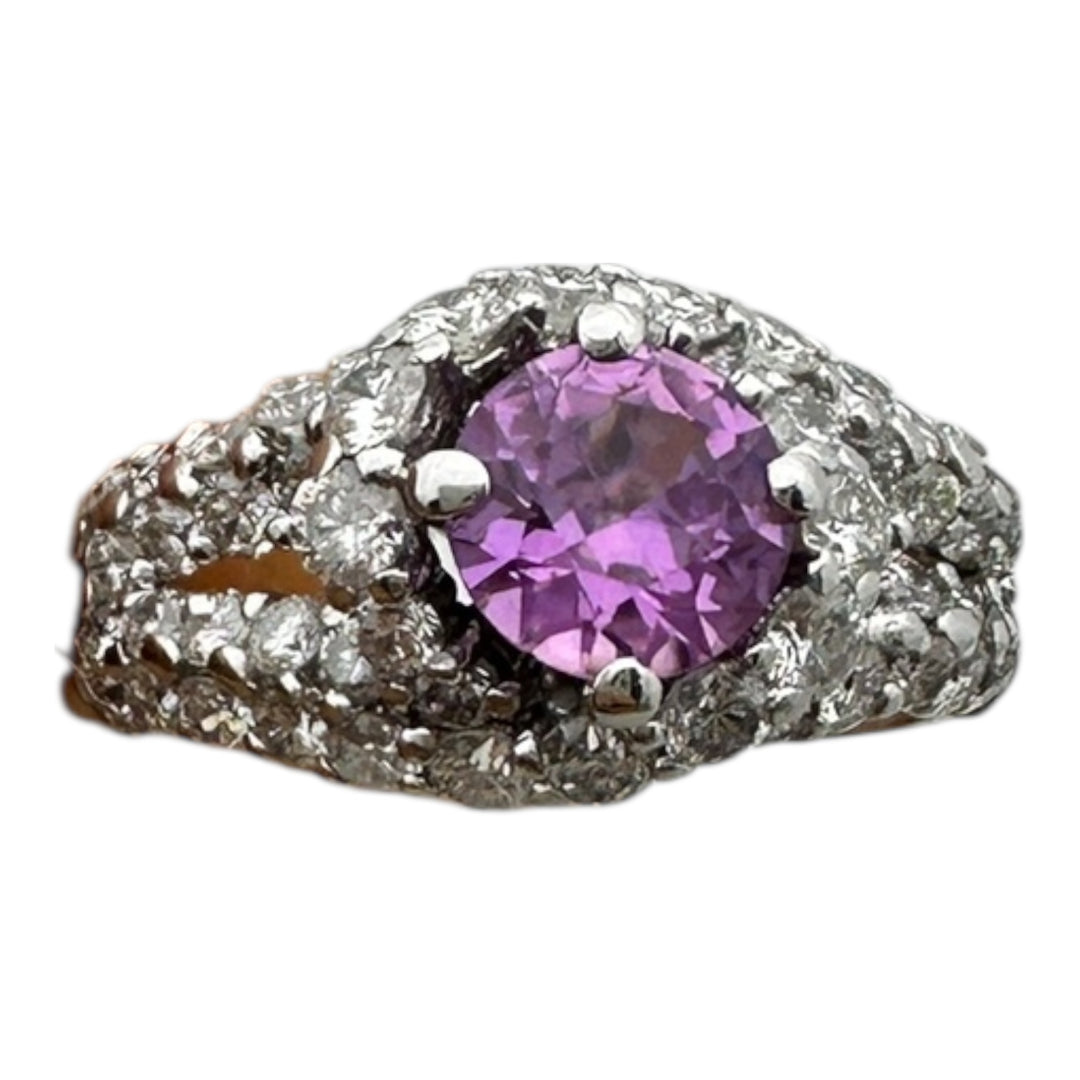 ￼ 14 karat white gold, pink, sapphire, and diamond Paved halo split shank ring