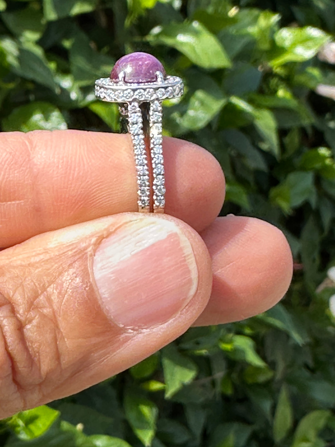18 karat white gold star ruby halo diamond ring