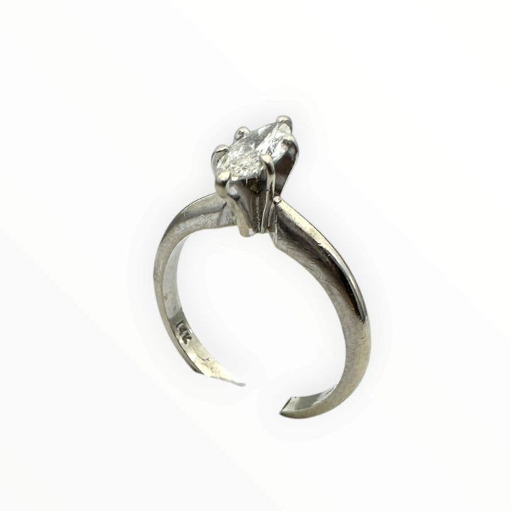 Classic .41 carat marquise–shaped diamond solitaire ring in 14 karat white gold