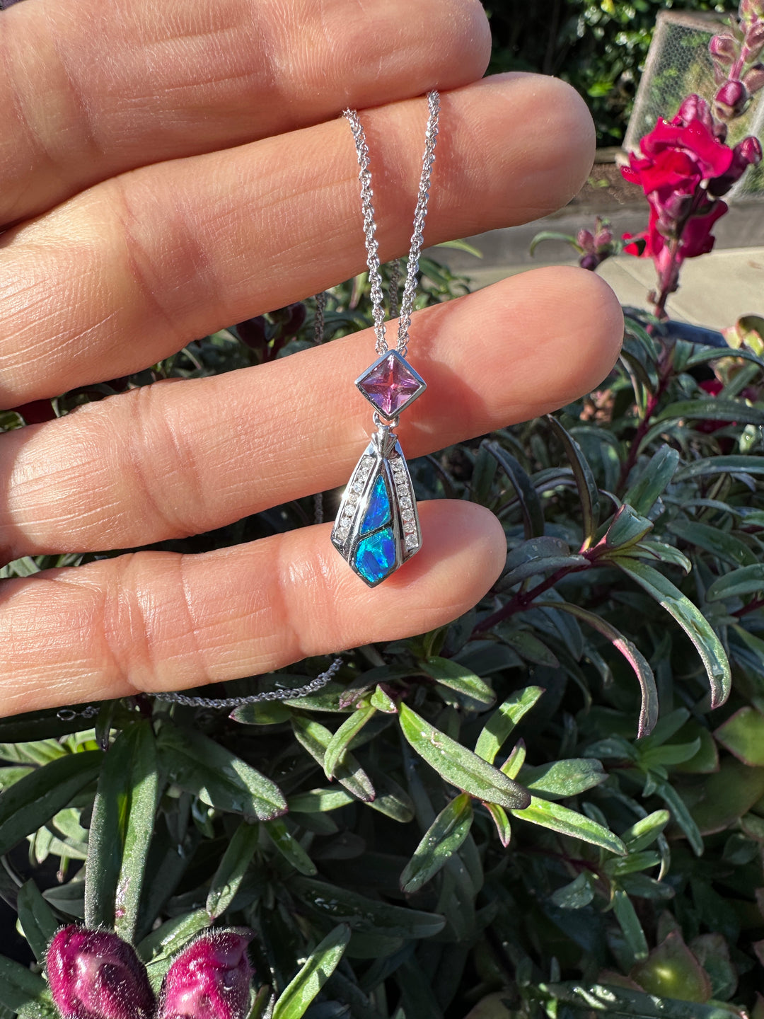 14 karat Opal, tourmaline, and diamond pendant with chain