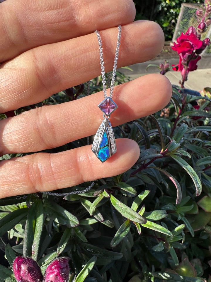 14 karat Opal, tourmaline, and diamond pendant with chain