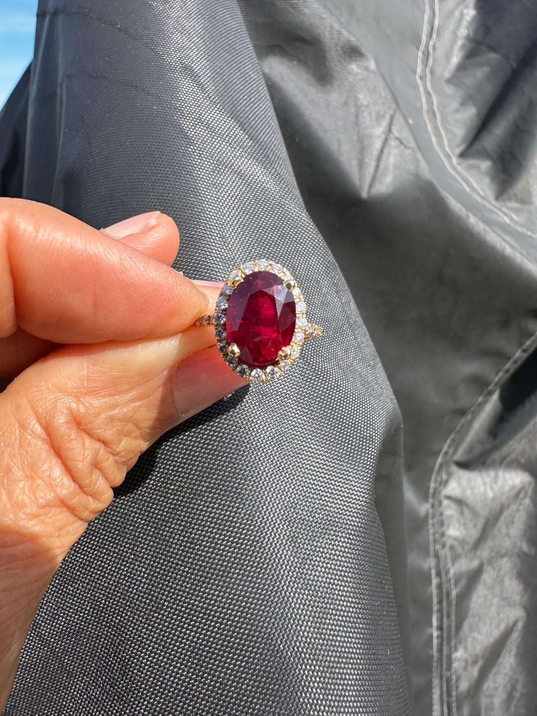 14 karat 3.93 carat red ruby halo ring