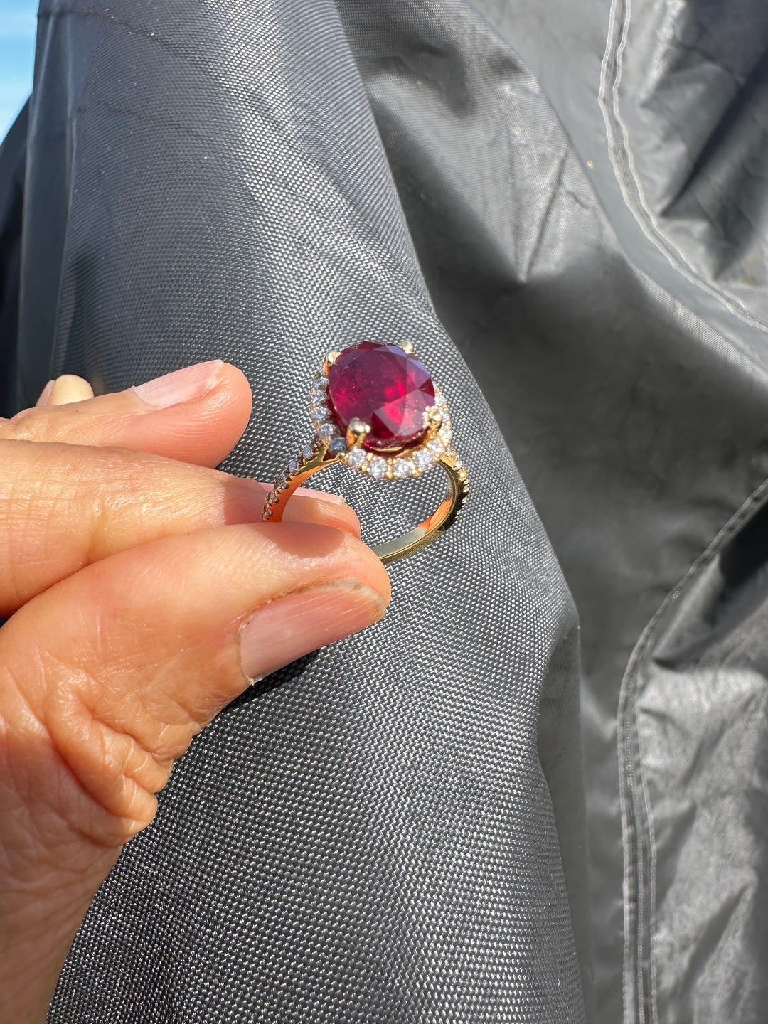 14 karat 3.93 carat red ruby halo ring