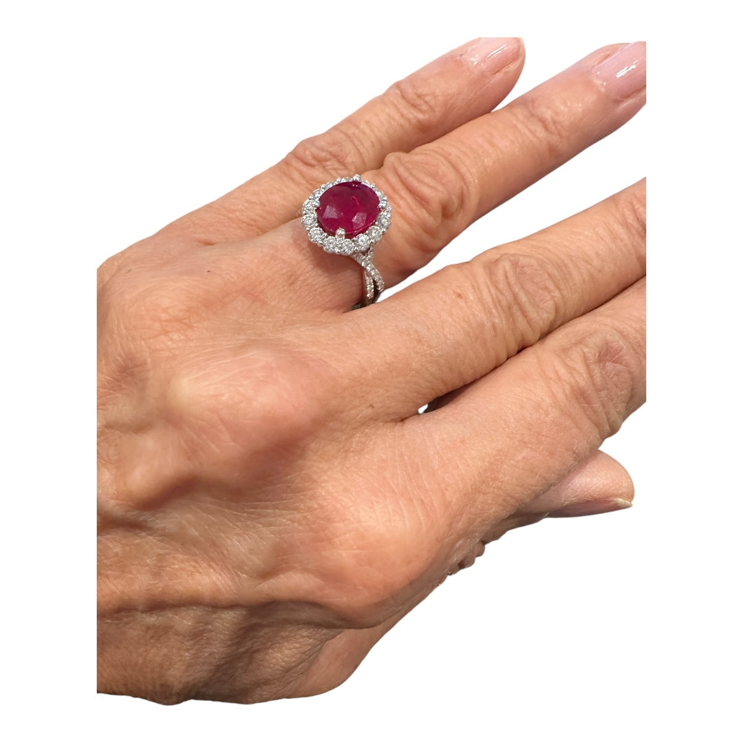 18 karat white gold, 3.58 ct ruby, and diamond halo ring.