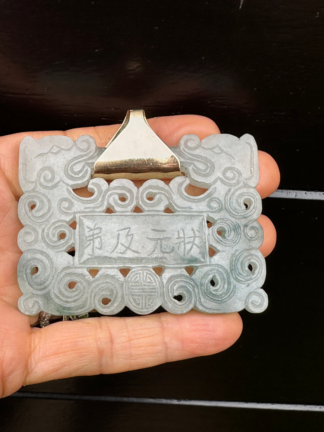￼ Lucky 14 karat 91.54 g carved green Jadeite pendant