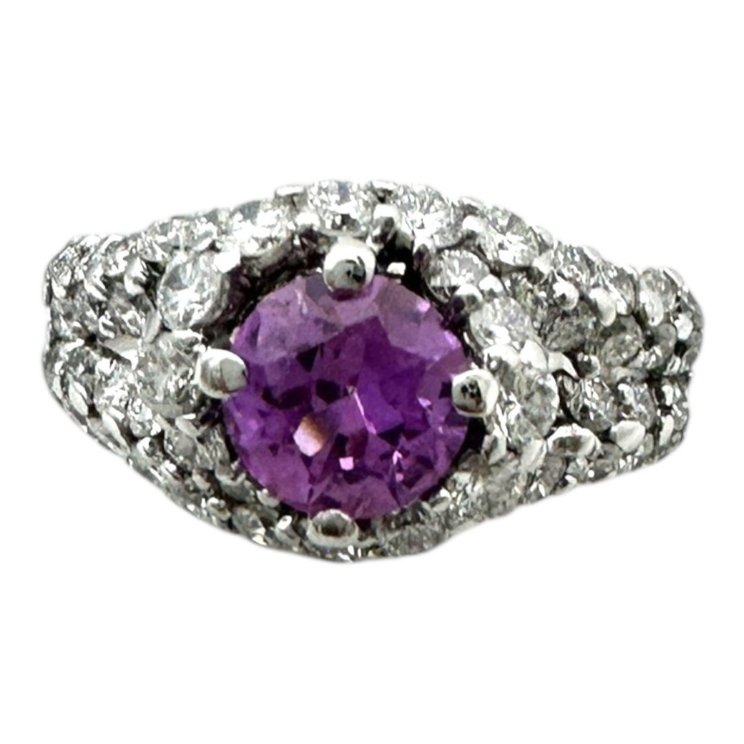 ￼ 14 karat white gold, pink, sapphire, and diamond Paved halo split shank ring