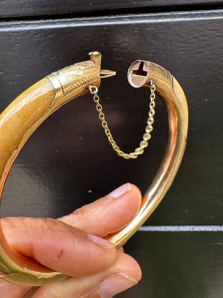 14 karat yellow gold butterscotch jadeite 7.40 mm bangle bracelet