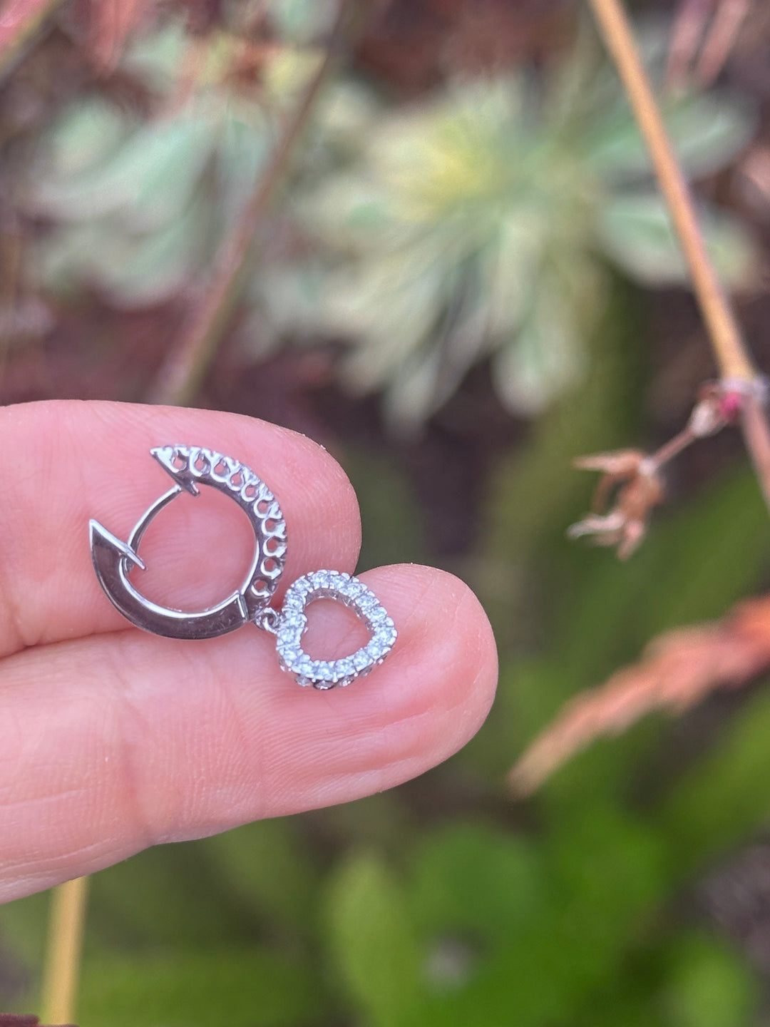 14 karat white gold Heart huggy earrings, .90 carat diamonds