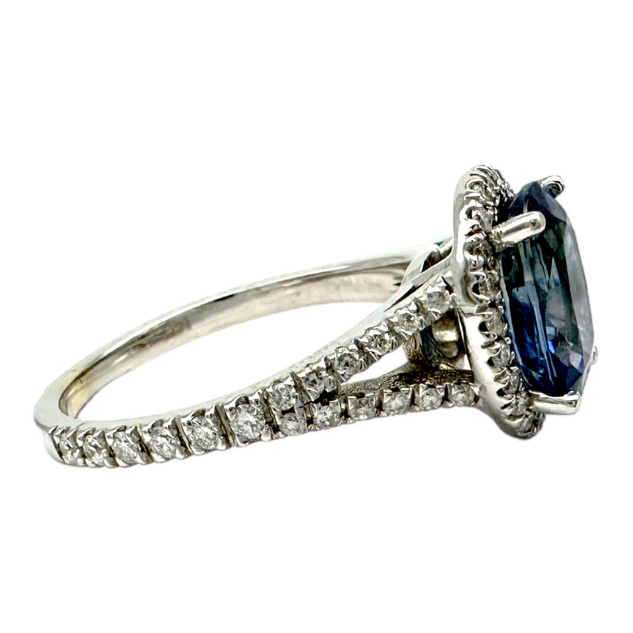 14 Karat Halo Diamond 2.60 Carat Oval Blue Sapphire Ring