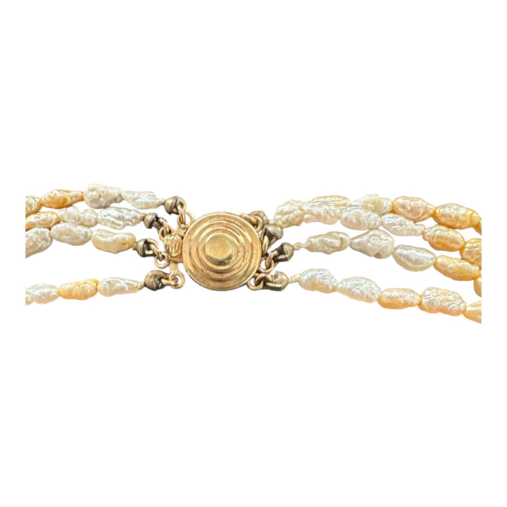 14 karat yellow gold, four strand, beige pearl necklace