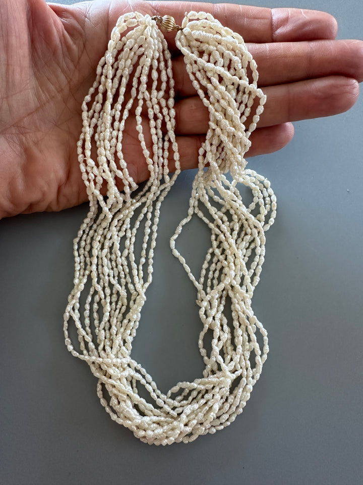 14 karat yellow gold multi strand 18 inch pearl necklace