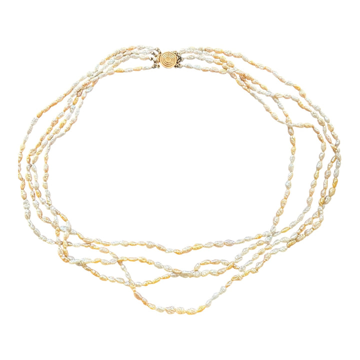 14 karat yellow gold, four strand, beige pearl necklace