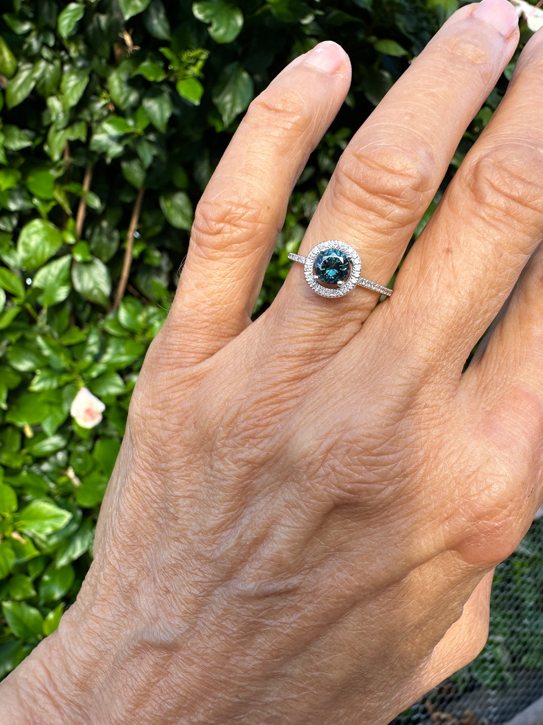 Simon G, 18 Karat Teal Colored Zircon Halo Eternity Band .90ct Ring