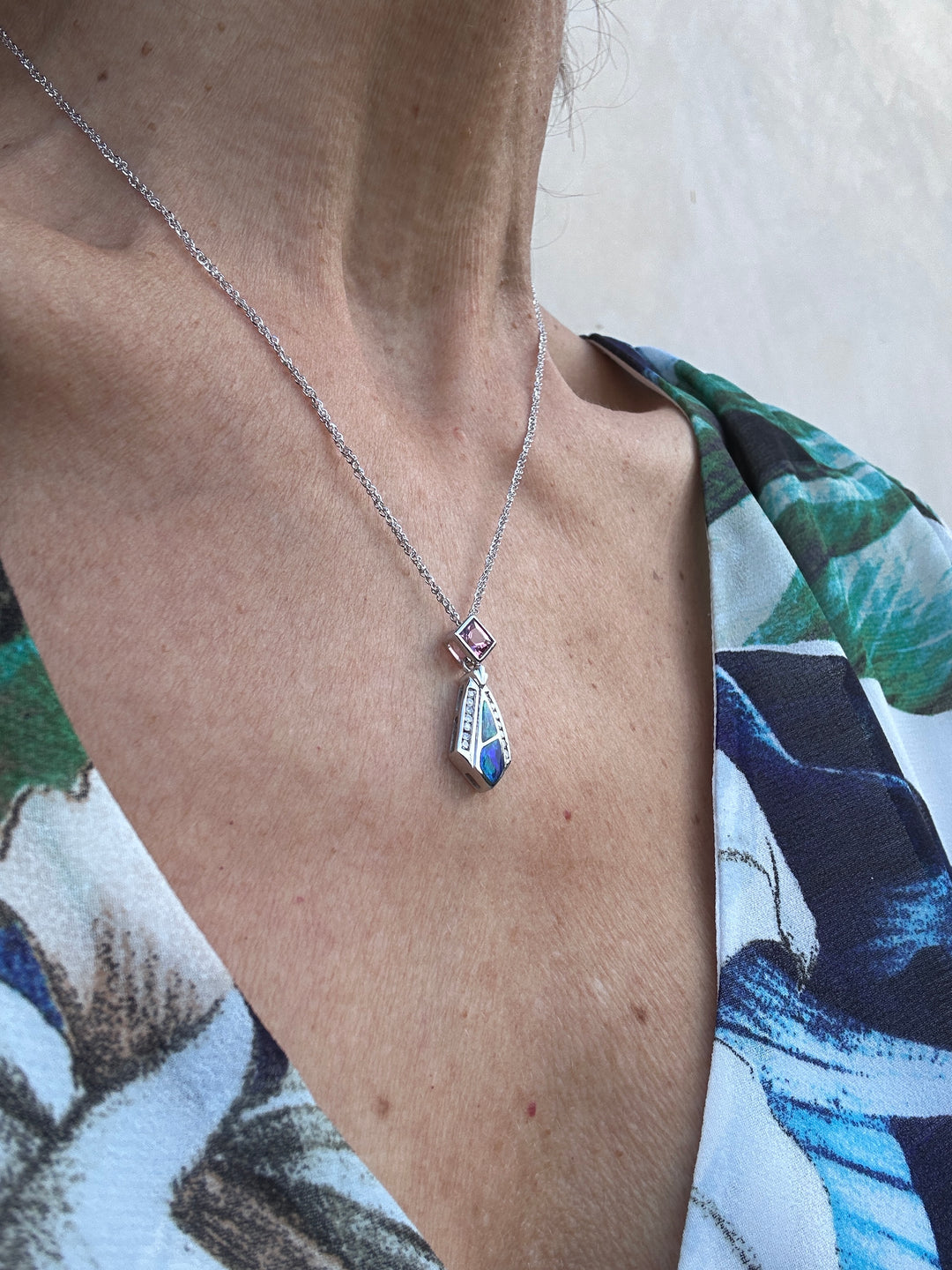 14 karat Opal, tourmaline, and diamond pendant with chain