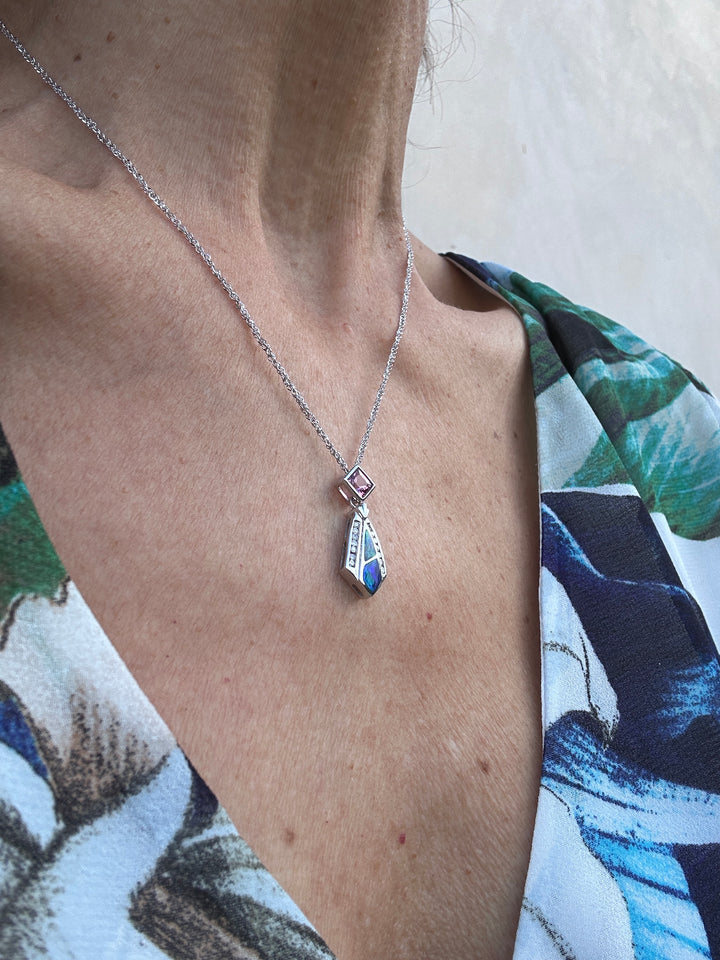 14 karat Opal, tourmaline, and diamond pendant with chain