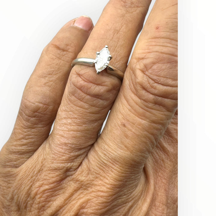Classic .41 carat marquise–shaped diamond solitaire ring in 14 karat white gold