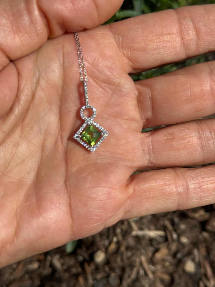14 Karat White Gold, Peridot, Halo 1.00tcw Diamond Pendant