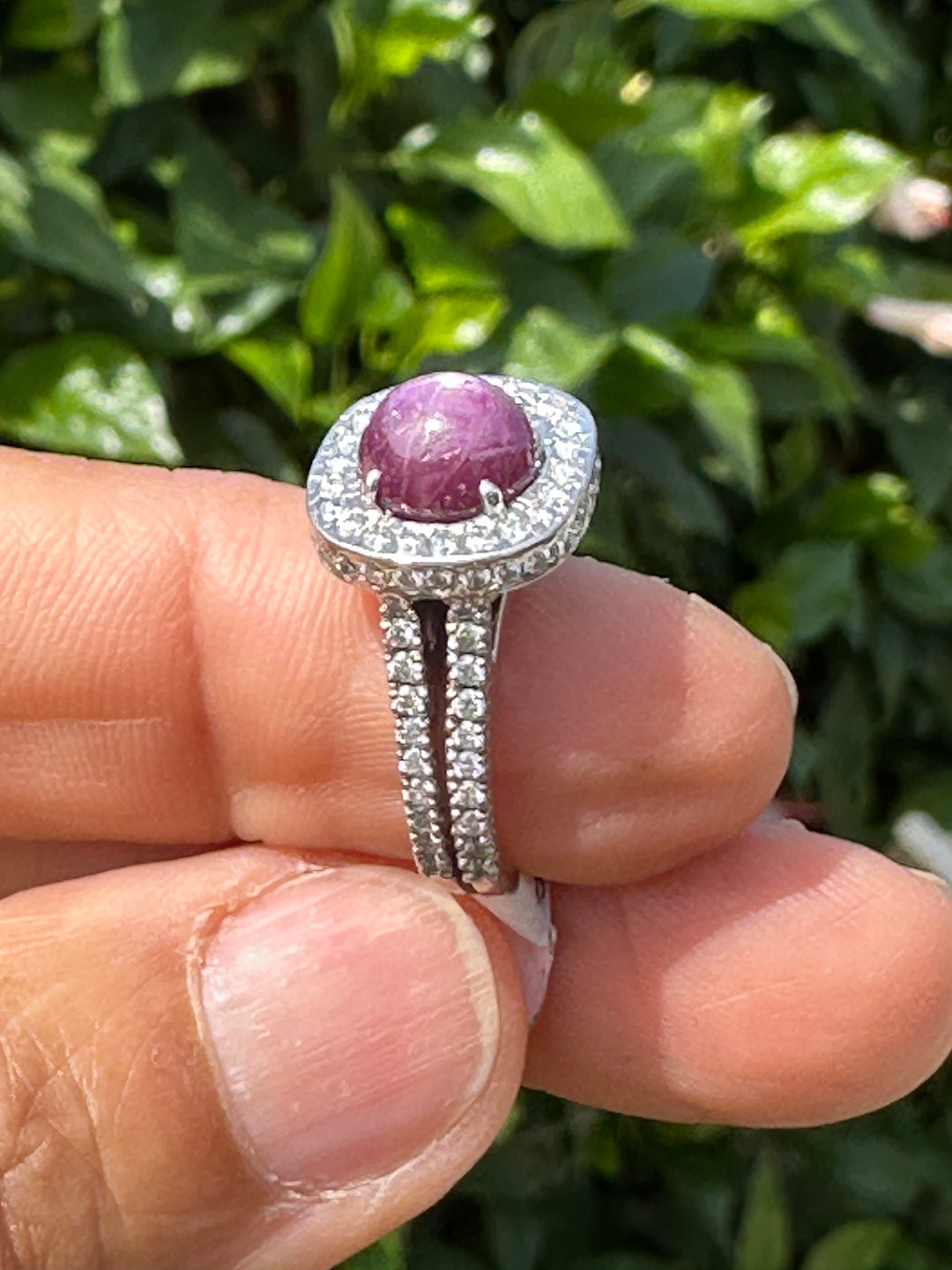18 karat white gold star ruby halo diamond ring