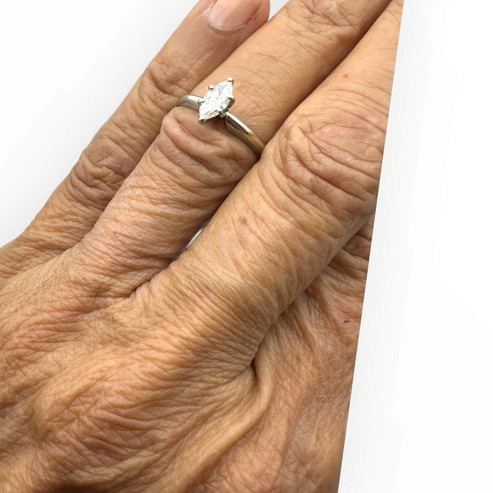 Classic .41 carat marquise–shaped diamond solitaire ring in 14 karat white gold