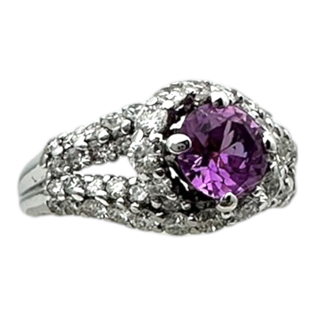 ￼ 14 karat white gold, pink, sapphire, and diamond Paved halo split shank ring