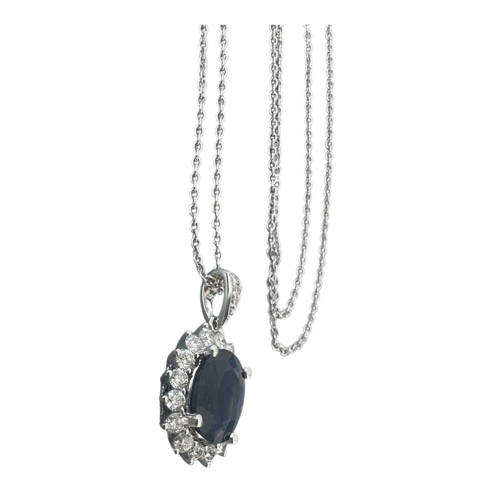 14 karat white gold 2.90 carat sapphire and Diamond Halo, pendant, and chain ￼