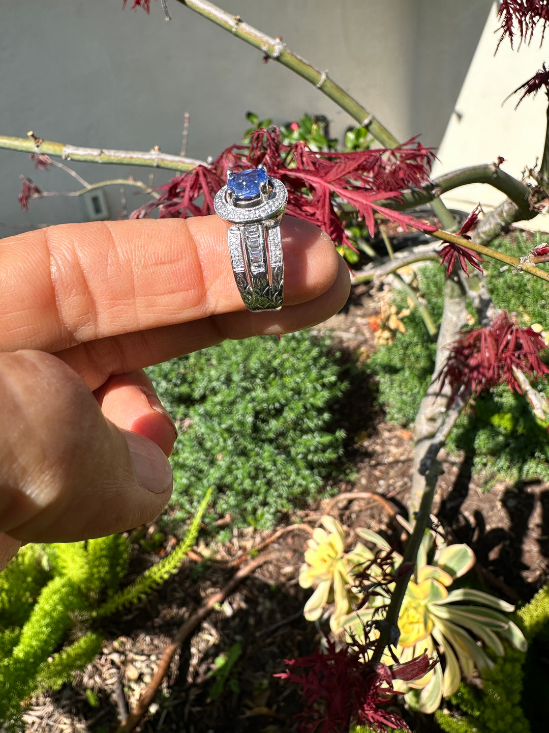 14 Karat White Gold 2.25TCW Blue Sapphire Halo Diamond and Baguette Ring