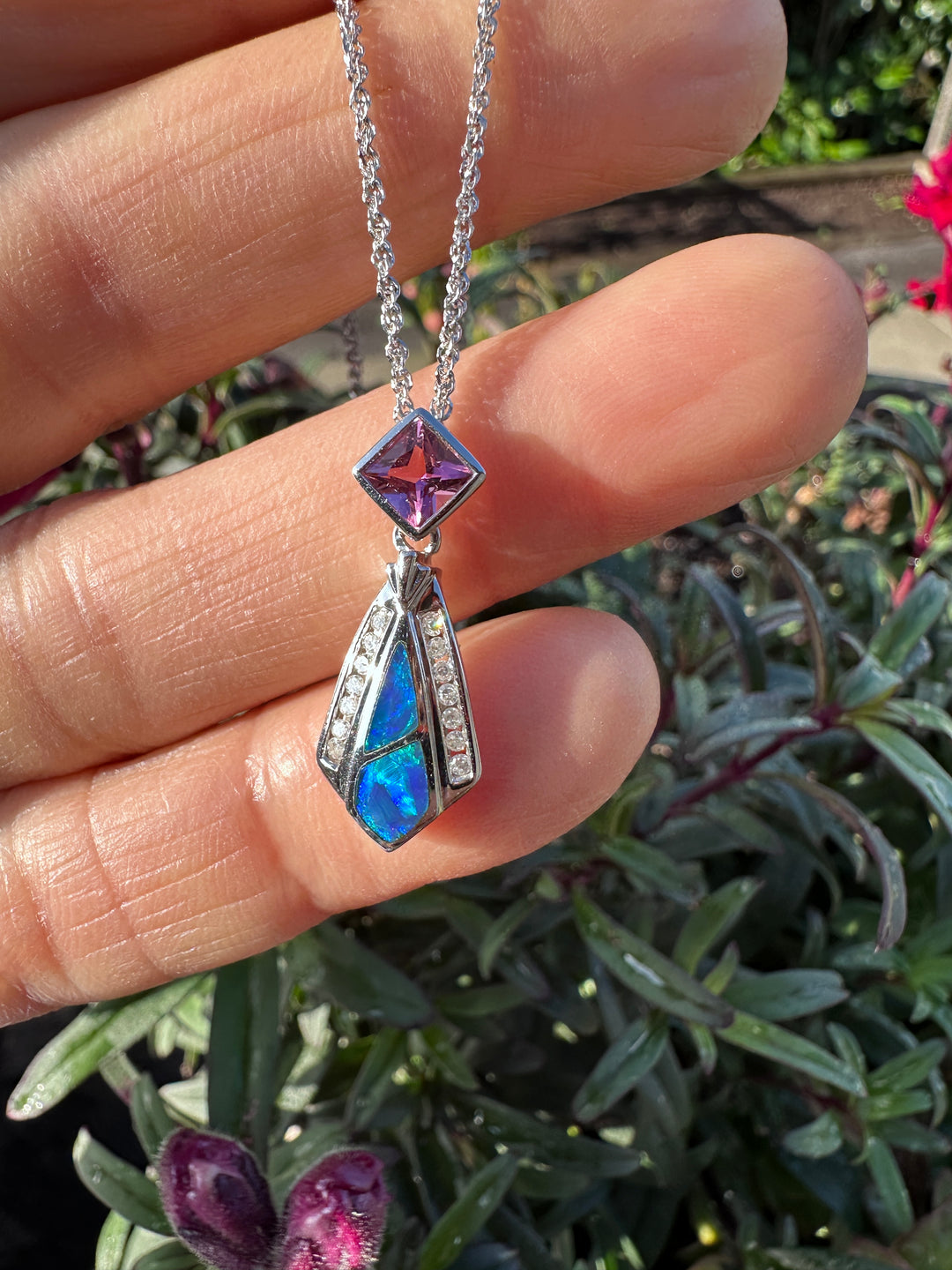 14 karat Opal, tourmaline, and diamond pendant with chain