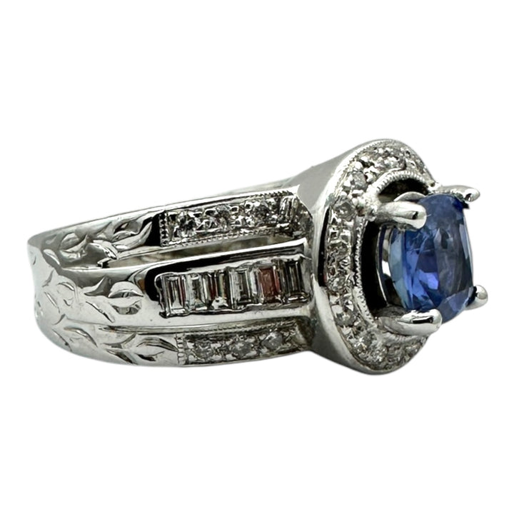 14 Karat White Gold 2.25TCW Blue Sapphire Halo Diamond and Baguette Ring