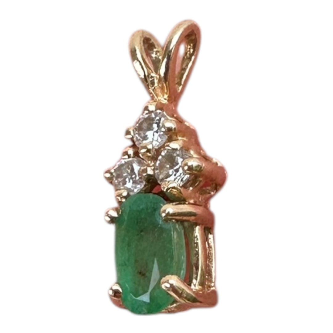14 Karat yellow gold diamond and emerald pendant