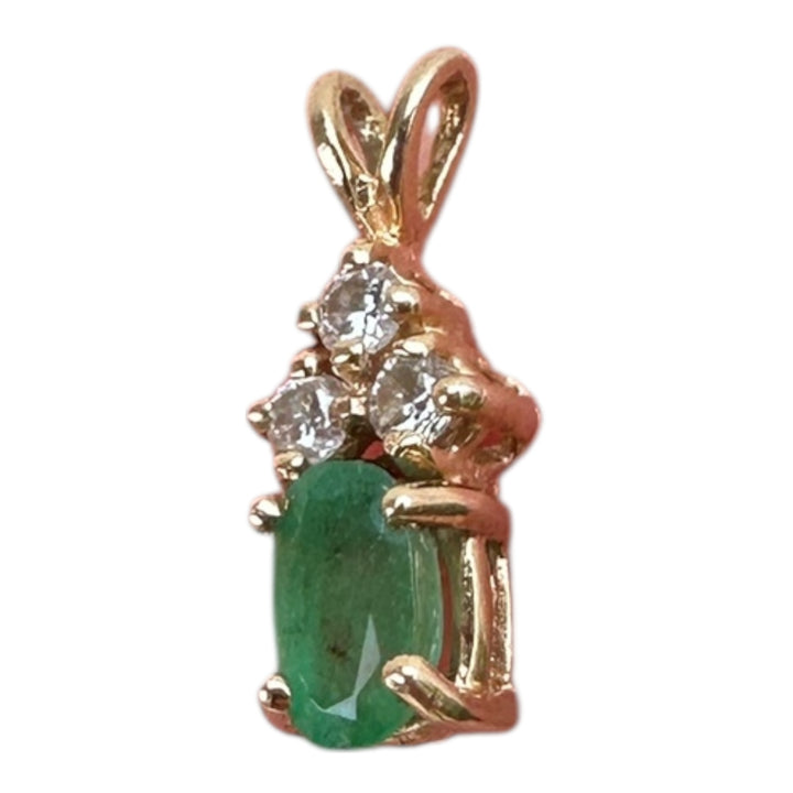 14 Karat yellow gold diamond and emerald pendant