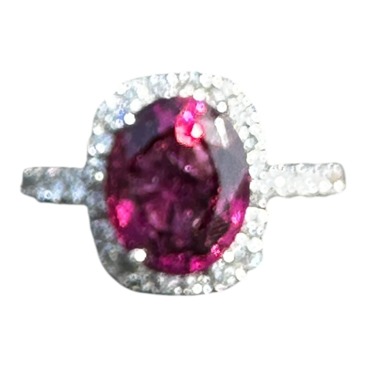 14 karat, 2 carat purple Tourmaline and diamond halo ring