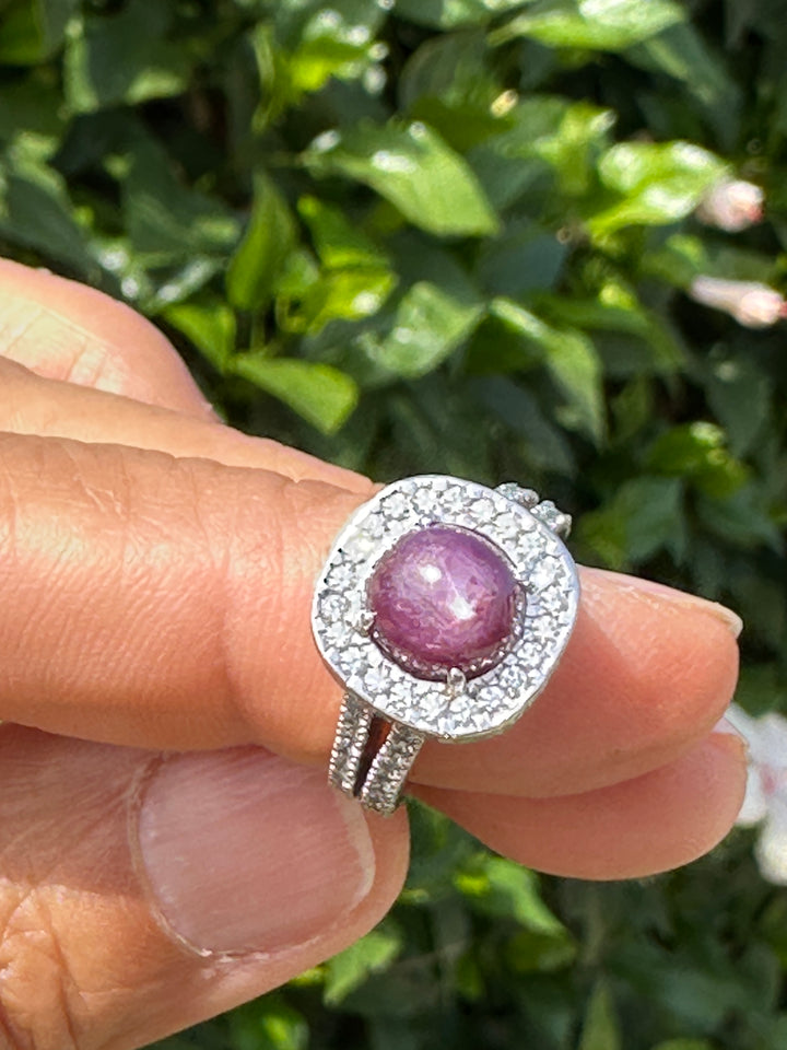 18 karat white gold star ruby halo diamond ring
