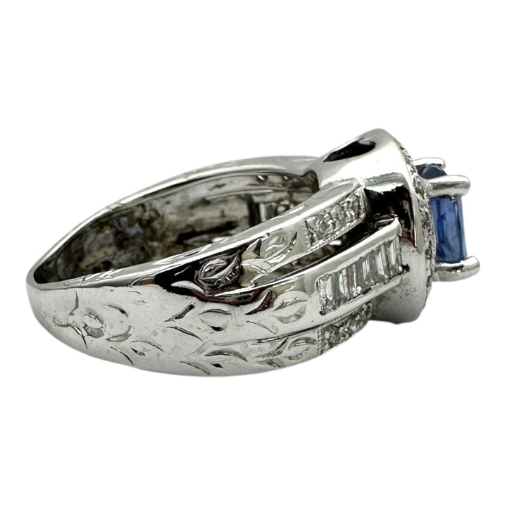 14 Karat White Gold 2.25TCW Blue Sapphire Halo Diamond and Baguette Ring