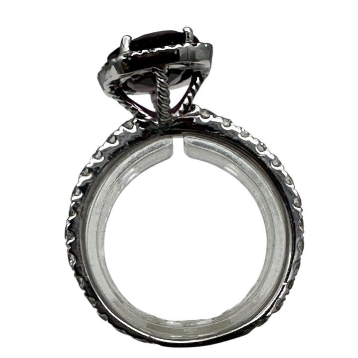 14 karat, 2 carat purple Tourmaline and diamond halo ring