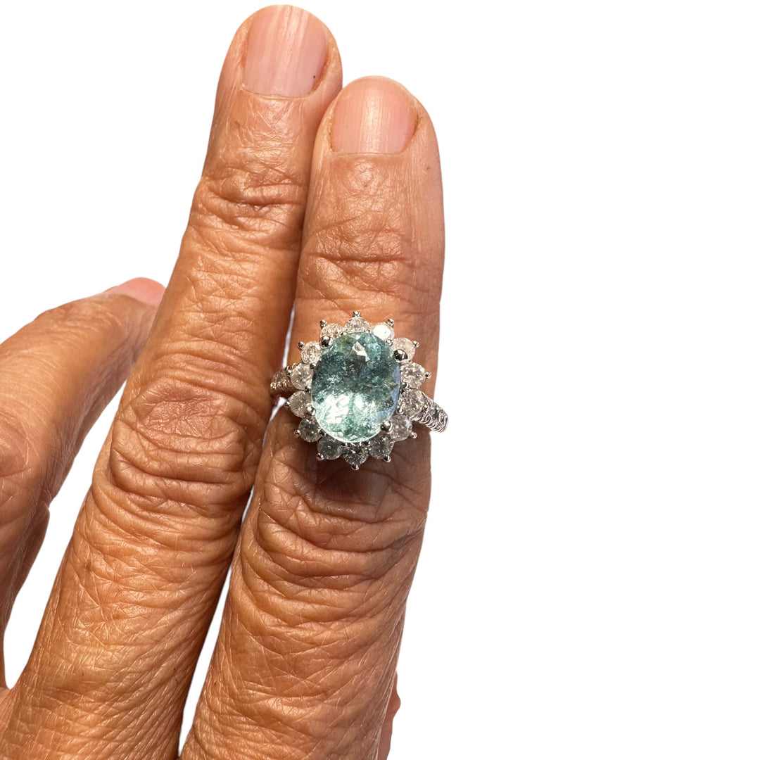14 karat white gold neon 4.50 Carat Paraiba Tourmaline halo diamond ring