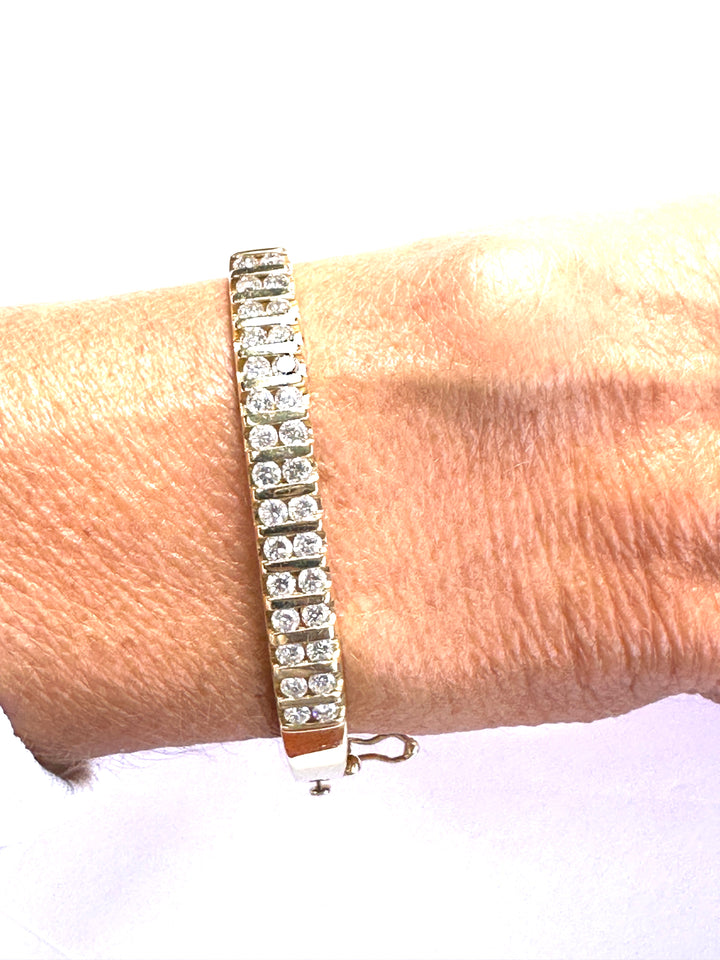 14 karat Gold Two-Row Round Brilliant Diamond Channel Bangle Bracelet, 3.00 Carats